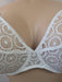 Chantelle Fete, a beautiful full cup bra on sale. Color Ivory. Style 1960. Front view.