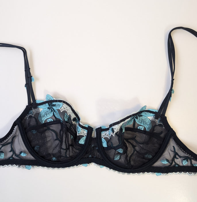 Lise Charmel, a seductive demi bra on sale. Color Bleu. Style AC3036. Inside view.