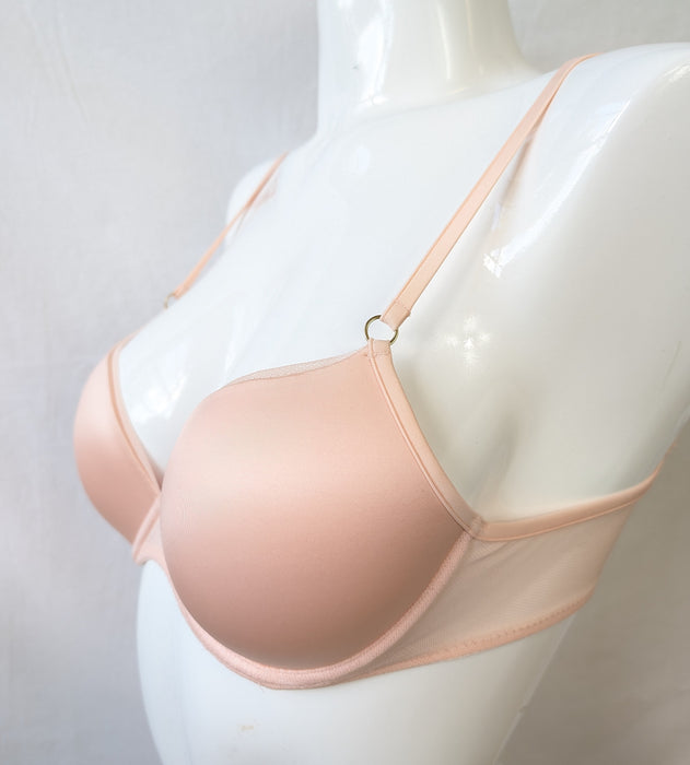 Marie Jo Undertones pushup bra uses a gradual increase in the foam to give you extra cleavage. On sale. Side view. Color Glossy Pink. Style 0102017.