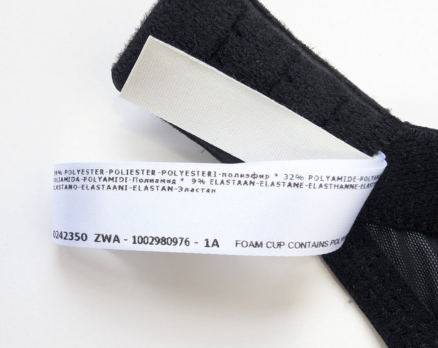 Prima Donna Twist Glass Beach, a beautiful bra for an ideal shape and hold. Color Black. Style 0242350. Tag view.